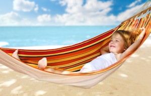 Child relaxing in a hammock